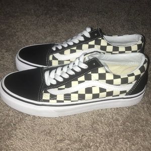 Checkered white and black vans